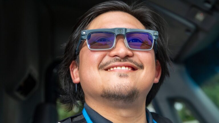 Amazon delivery associate wearing Smart Delivery Glasses on a route