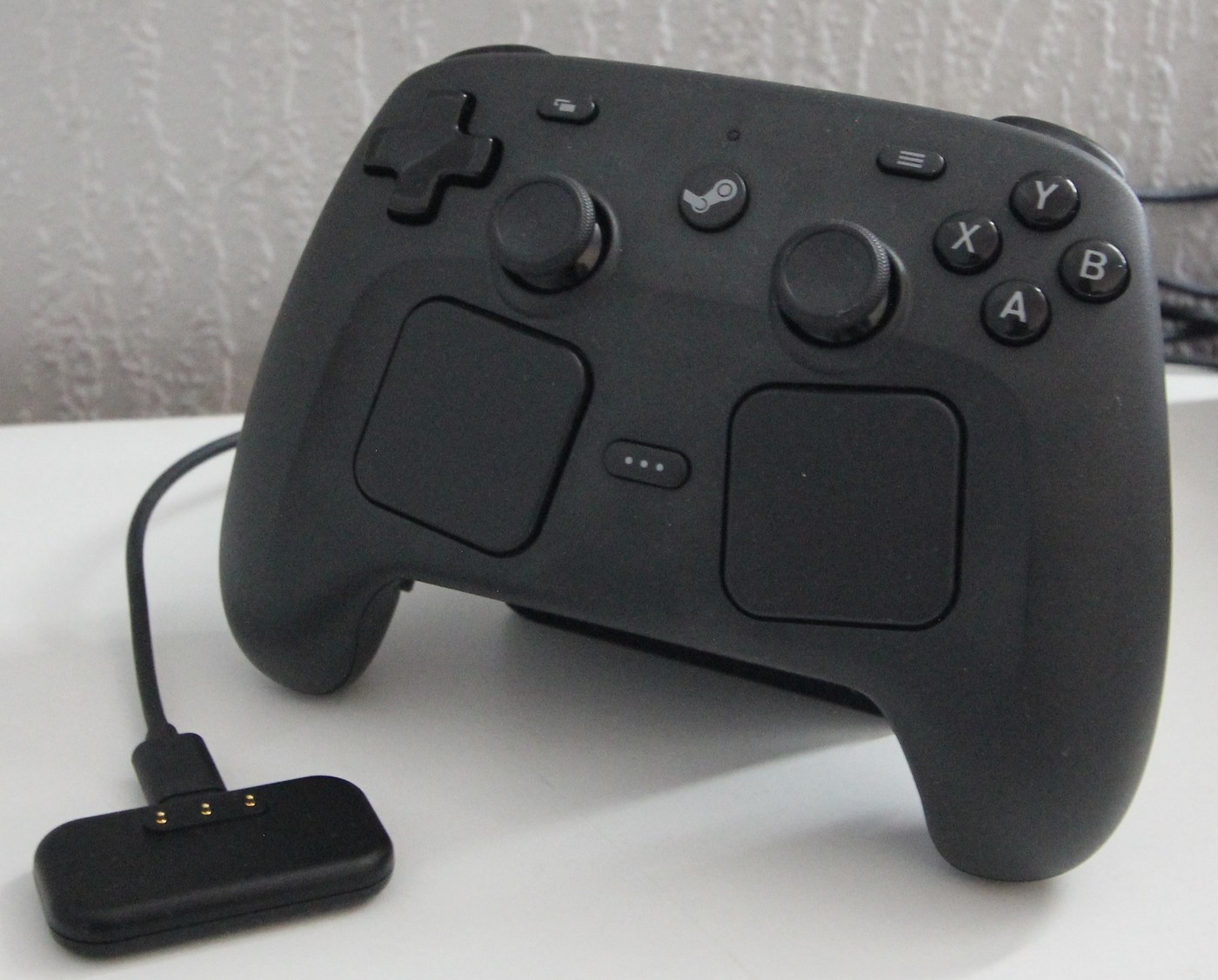 Steam Controller 2026 with trackpad puck