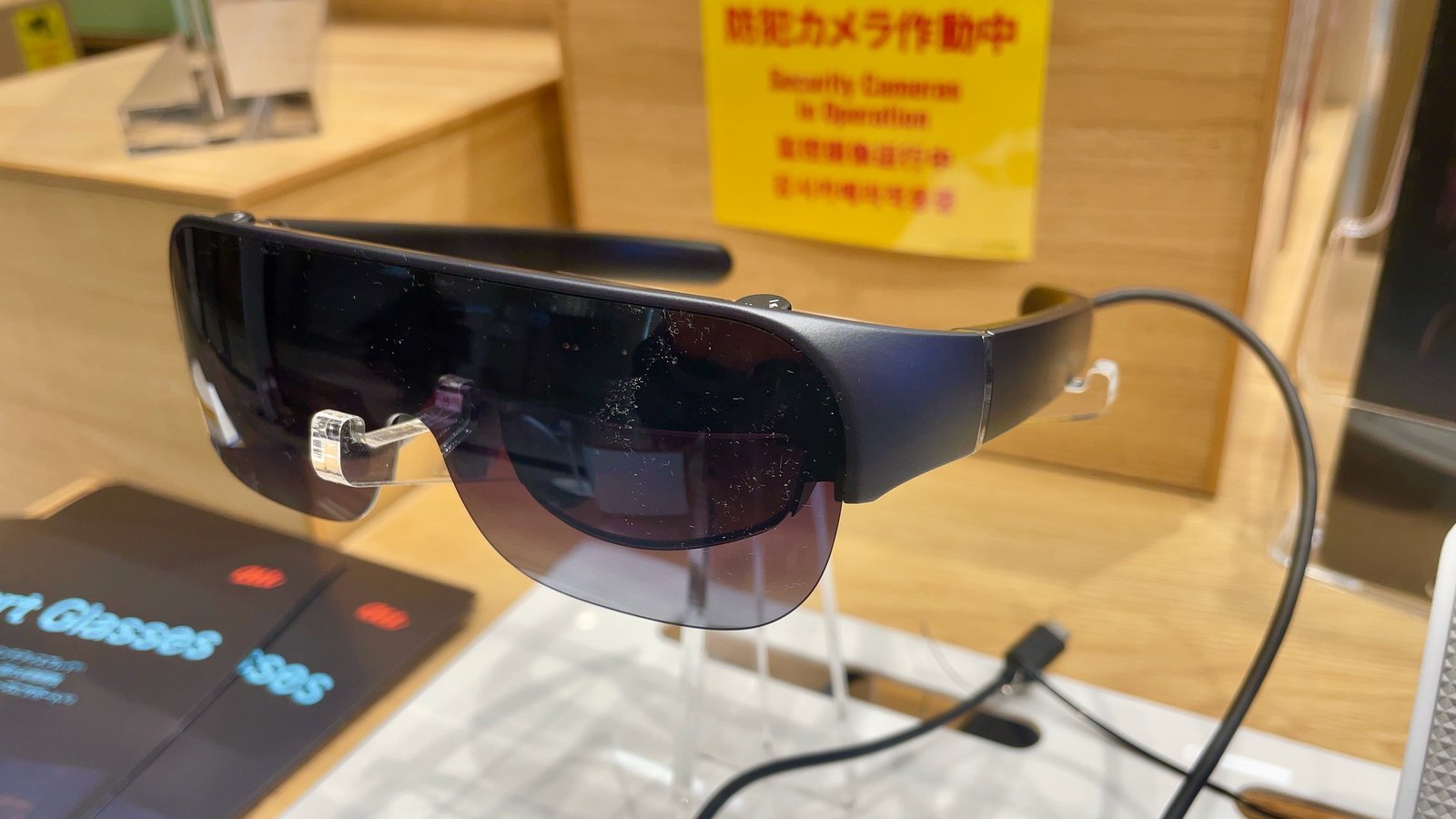 Consumer smart glasses product photo for context — Wikimedia Commons, not the Megane Top model