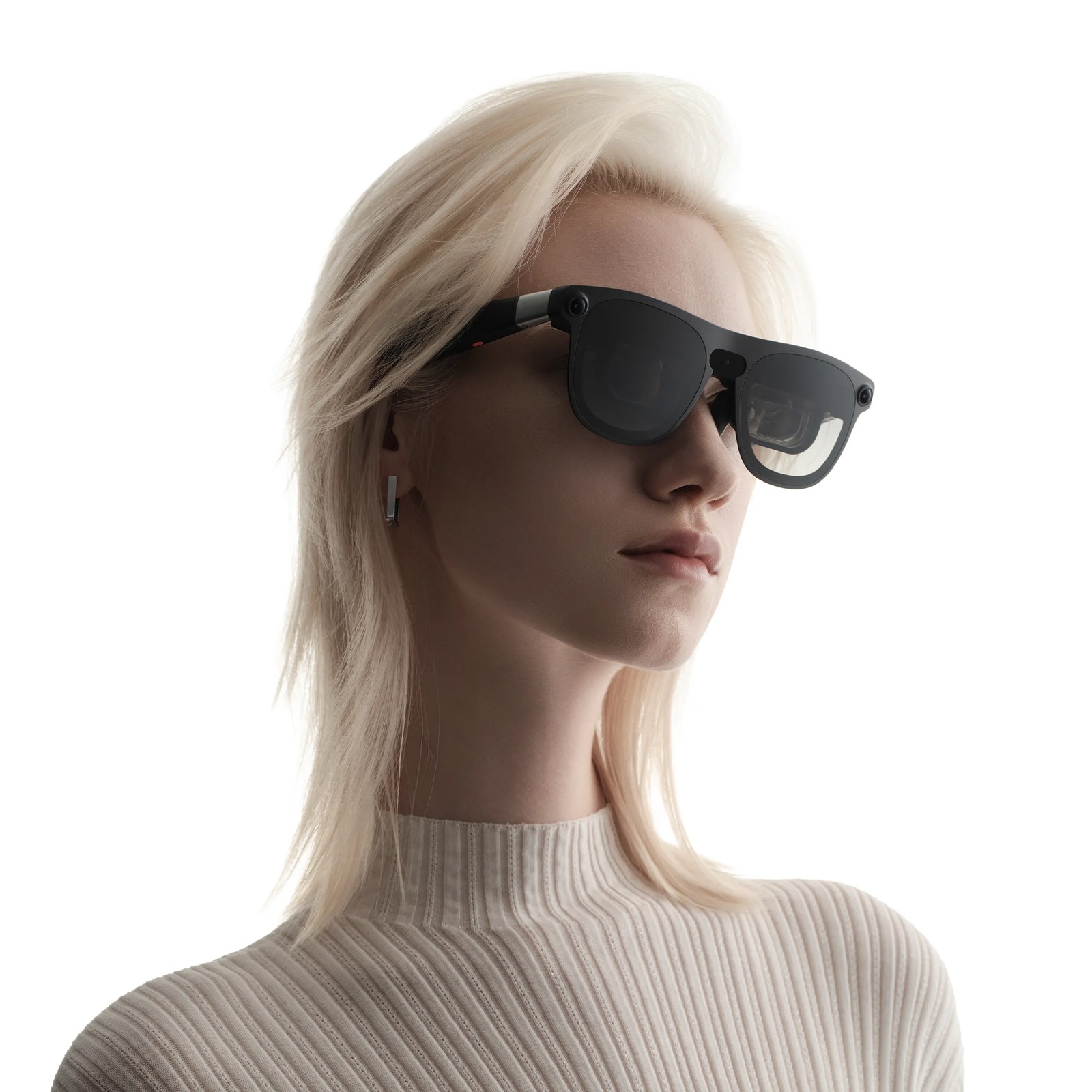 Person wearing XREAL AURA Android XR glasses