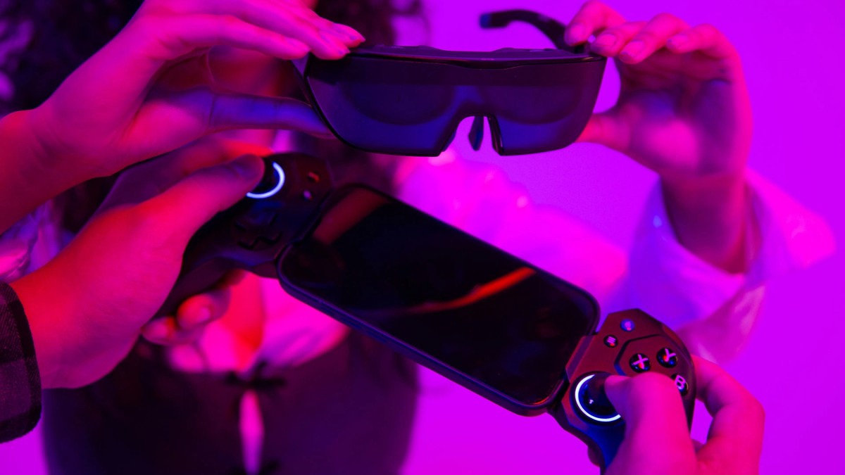 ELO Sentinel XR Gaming Glasses product photo on purple background