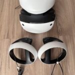PlayStation VR2 headset on a dark surface