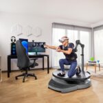 Virtuix Omni One full-body VR system with kneeling stance and tracked firearm prop