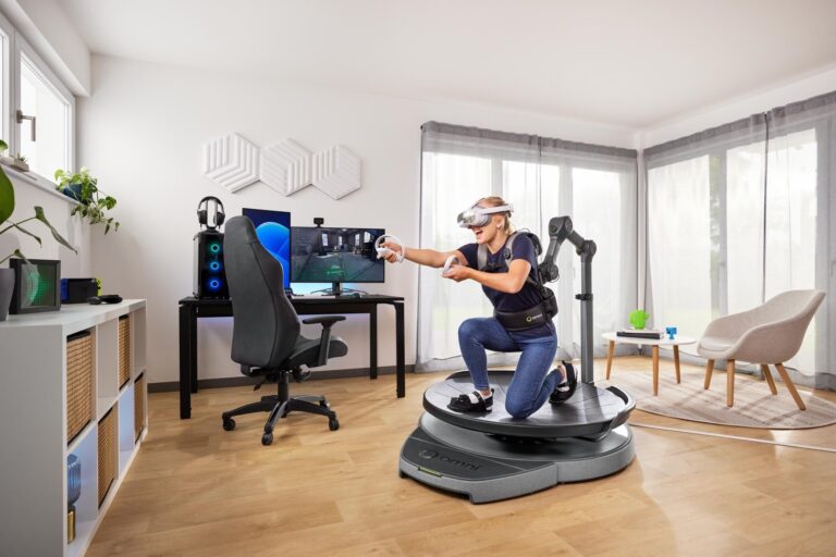Virtuix Omni One full-body VR system with kneeling stance and tracked firearm prop