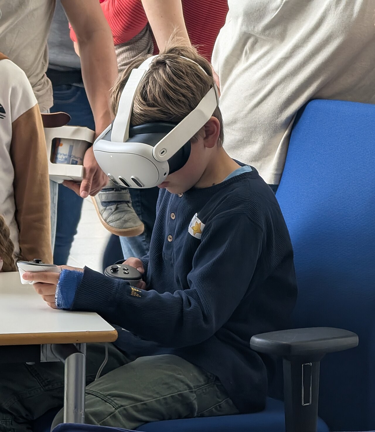 Visitor wearing a Meta Quest 3 VR headset