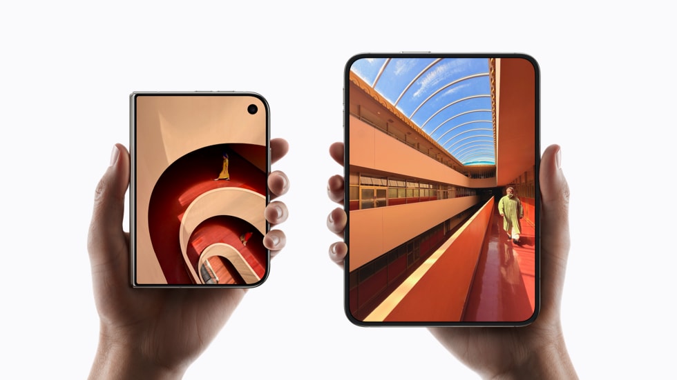 Hands holding folded and unfolded iPhone Duo