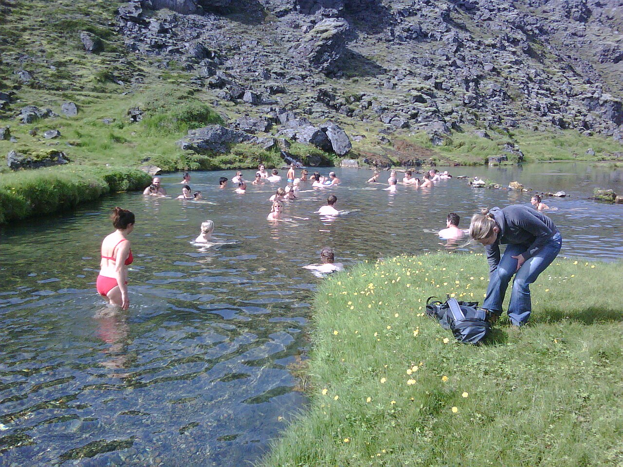Landmannalaugar thermal pool and colorful rhyolite hills