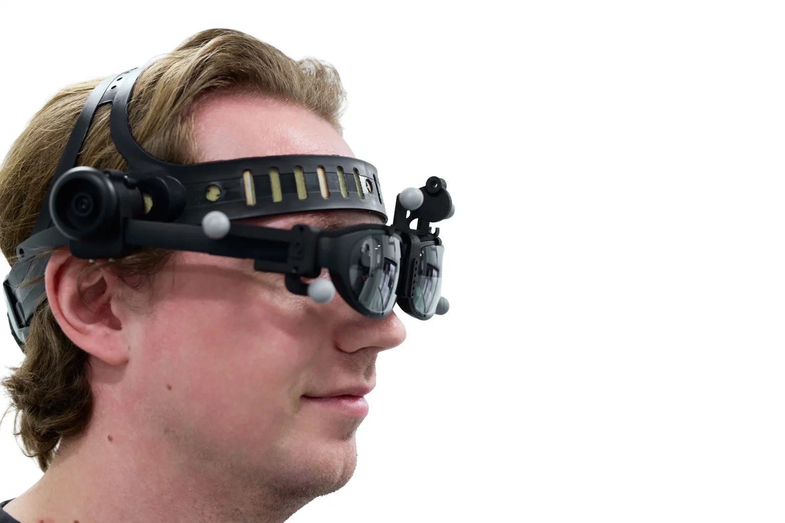Surgeon wearing OnPoint AR headset during spine navigation