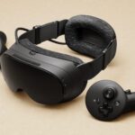 Steam Frame headset and controllers on a light surface