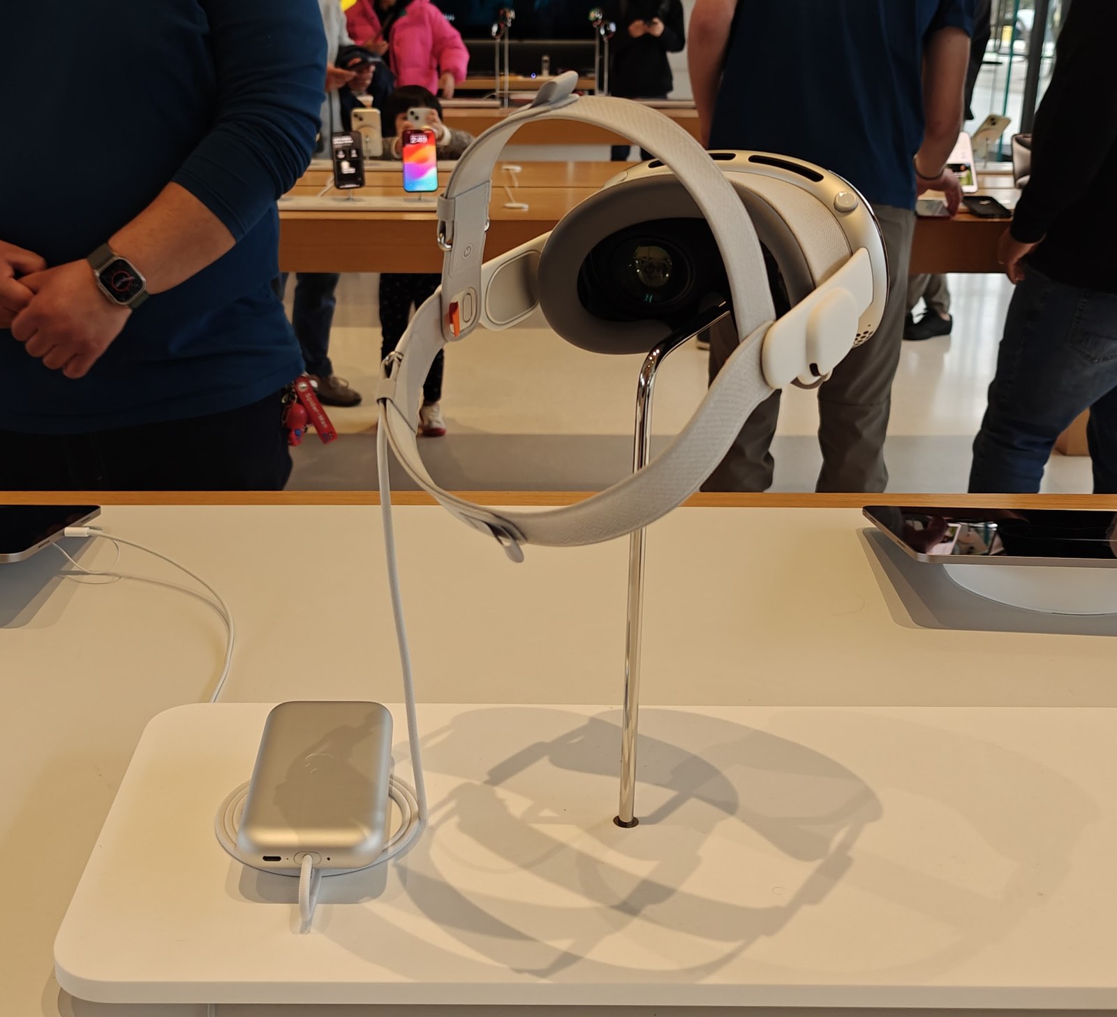 Apple Vision Pro with external battery charger pack