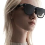 Person wearing XREAL AURA Android XR glasses, official product photography