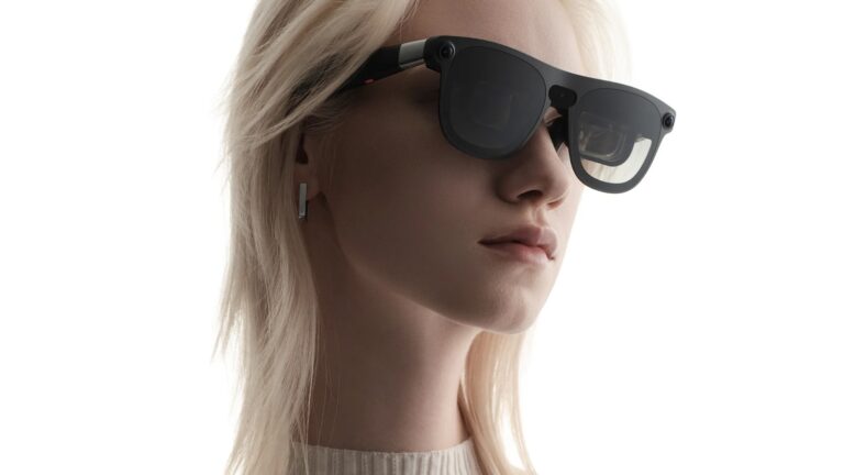 Person wearing XREAL AURA Android XR glasses