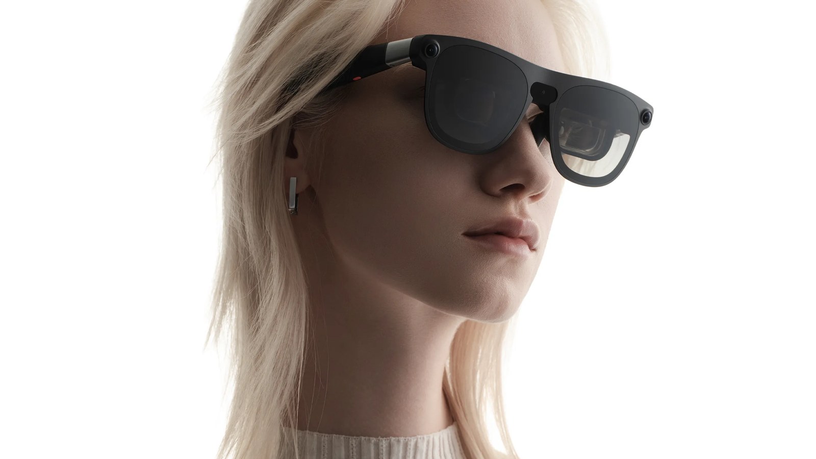 Person wearing XREAL AURA Android XR glasses