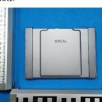 Closed silver XREAL folding keyboard in FCC external photo lab setup