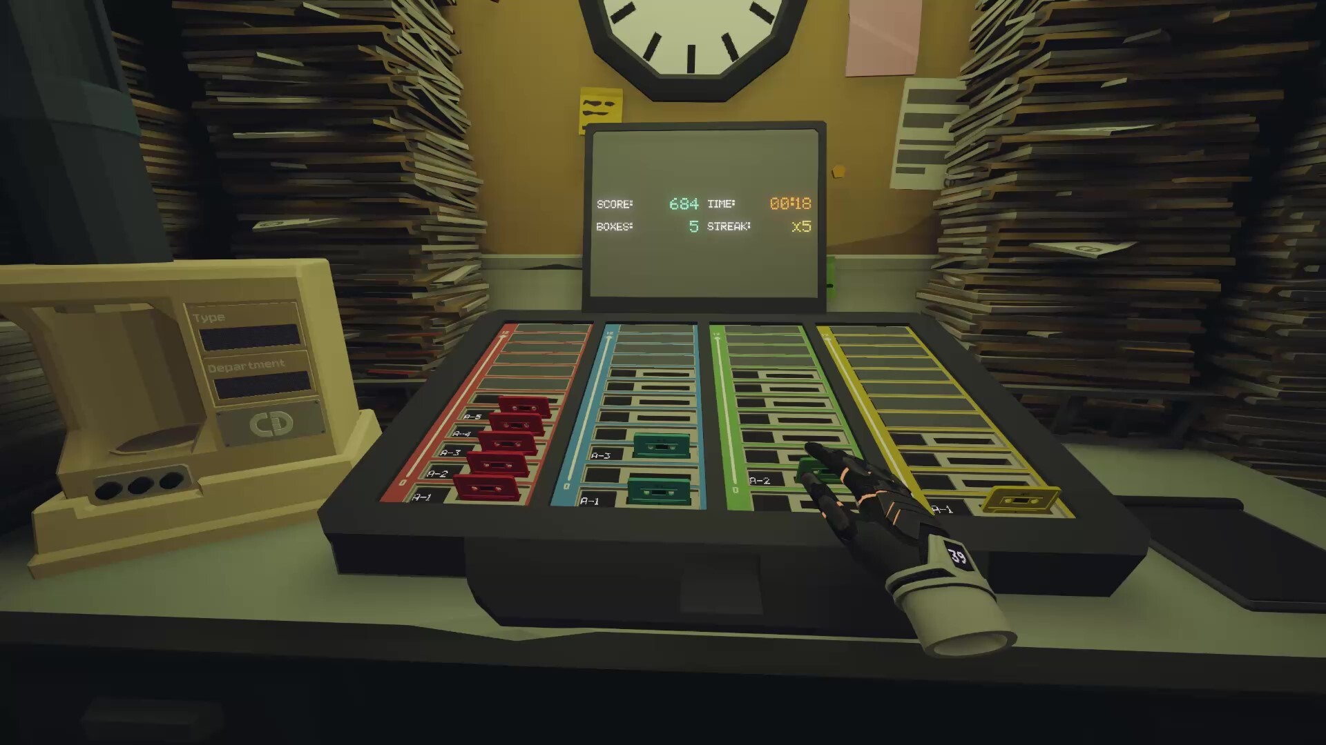 Good Morning [Employee Name] VR screenshot: a hand works a color-coded analog console beside stacked paper files
