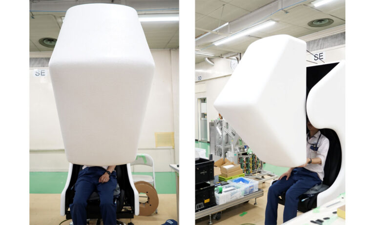 Kyushu University mountless aerial HMD chair with micromirror optics projecting a stereoscopic VR scene