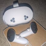 Meta Quest 3S headset with two Touch Plus controllers resting on its box