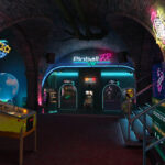Pinball FX VR arcade hub on Steam Frame, with Curse of the Mummy table in the foreground (Zen Studios)