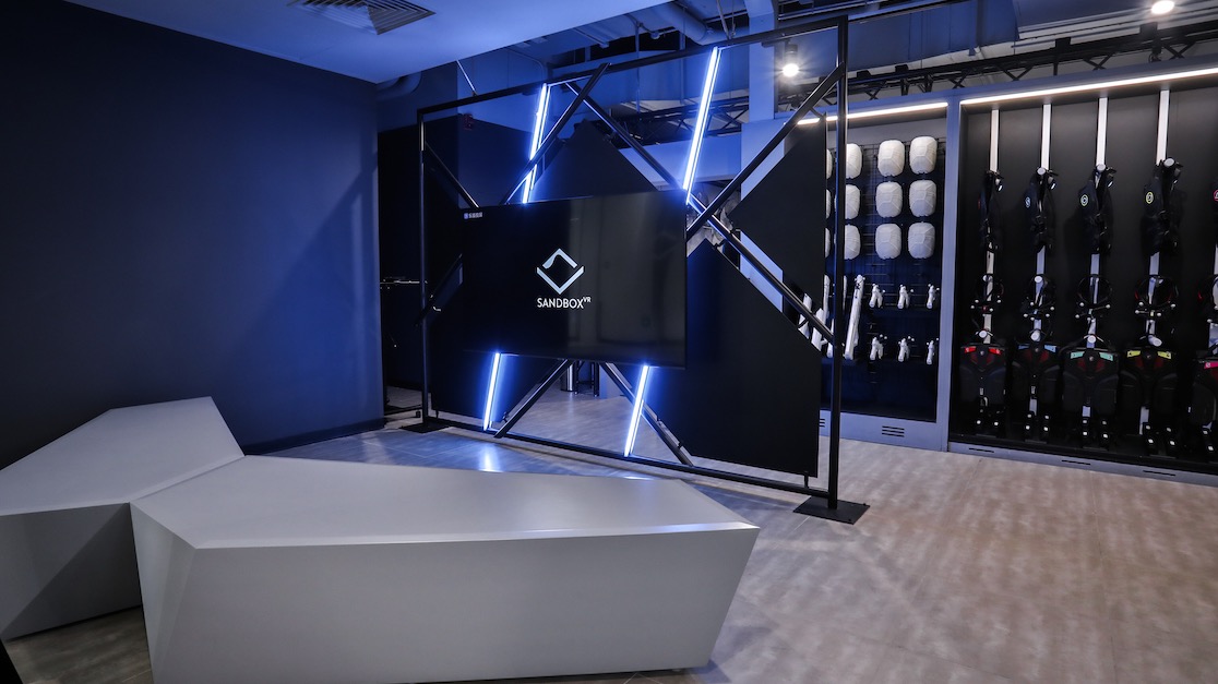 Guests in Sandbox VR headsets and haptic gear during a location-based session