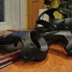 HTC VIVE headset and two VIVE wand controllers, which are tracked by SteamVR Lighthouse base stations