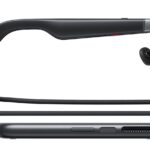 XREAL AURA glasses connected by cable to the compute puck, side view