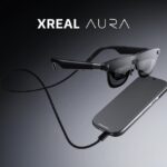 XREAL Aura Android XR glasses with their tethered compute puck, shown in XREAL's launch press image